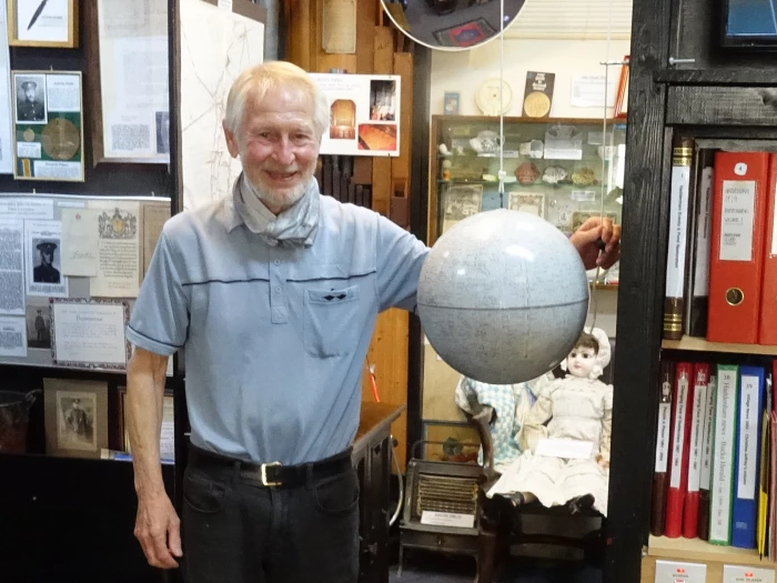alan rose with globe