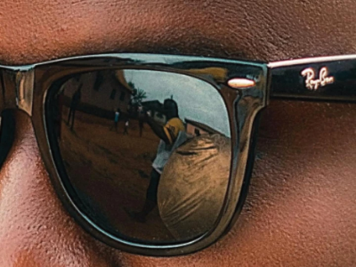 Man wearing Ray-ban sunglasses