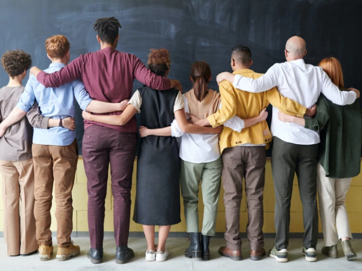 Group of People Standing Indoors