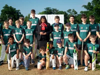 As part of its Tattenhall Community Fund, Redrow has donated £1,280 for shirts, caps and helmets with Redrow branding for the U9, U11, U13, U15 and U18 teamsPictured are Redrow Sales Consultant Anita Gillespie with the squad. credit:  leeboswel