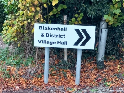 Sign pointing the way to Blakenhall and District Village Hall