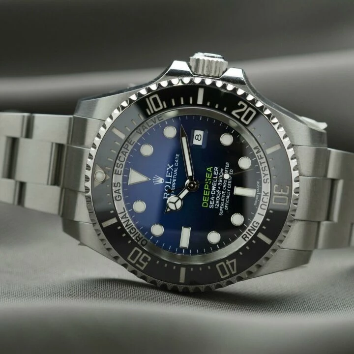 Round Rolex Analog Watch With Silver-colored Link Bracelet