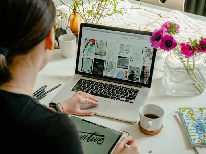Photo of Person Using Laptop For Graphic Designs