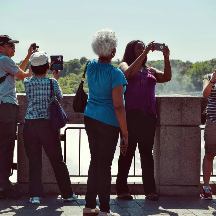 People Taking Pictures during Daytime