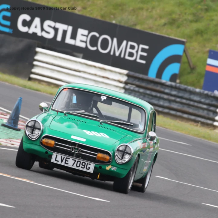 Green race car with Castle Combe logo April 2024