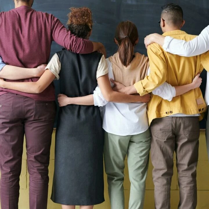 Group of People Standing Indoors