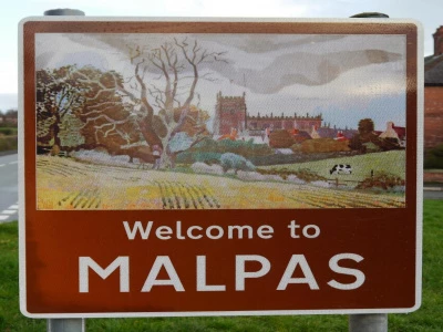 Malpas village boundary sign