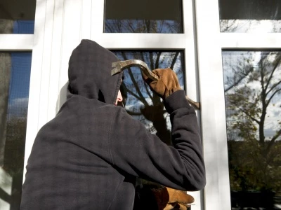 burglar-opening-window