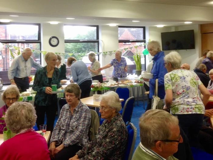 busy coffee lounge and cake stall