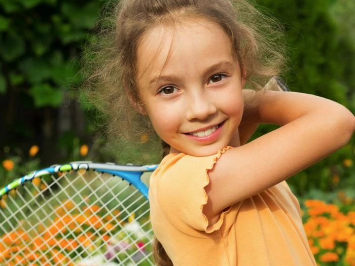 child tennis player
