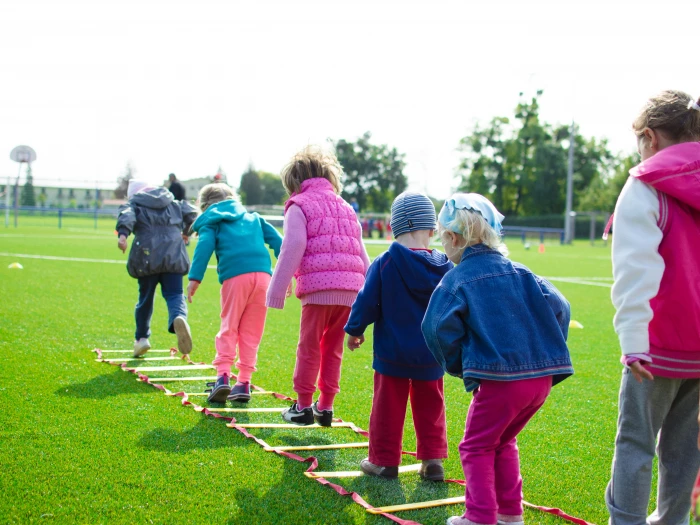 children39s team building on green grassland