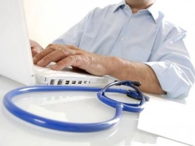 doctor at computer