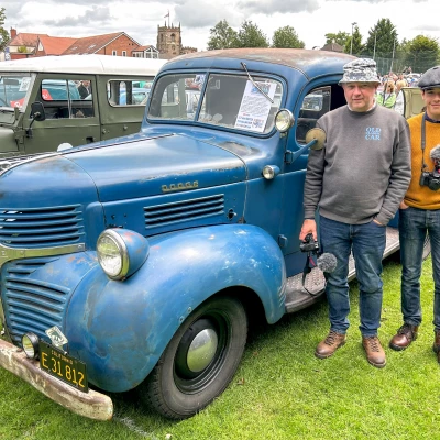 dodge pickup on display on audlem playing field with owner richard jones and son harley