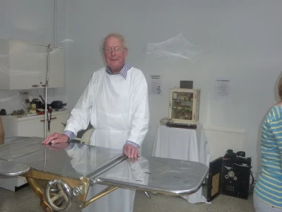 dr campbell in 1920 style operating theatre