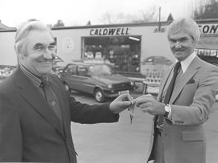 frank passant wins a car