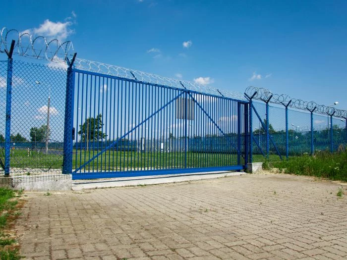 industrial gates with barbed wire