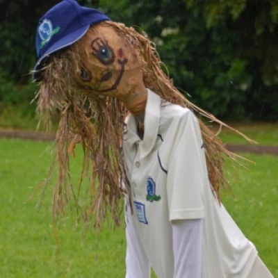 junior cricket scarecrow