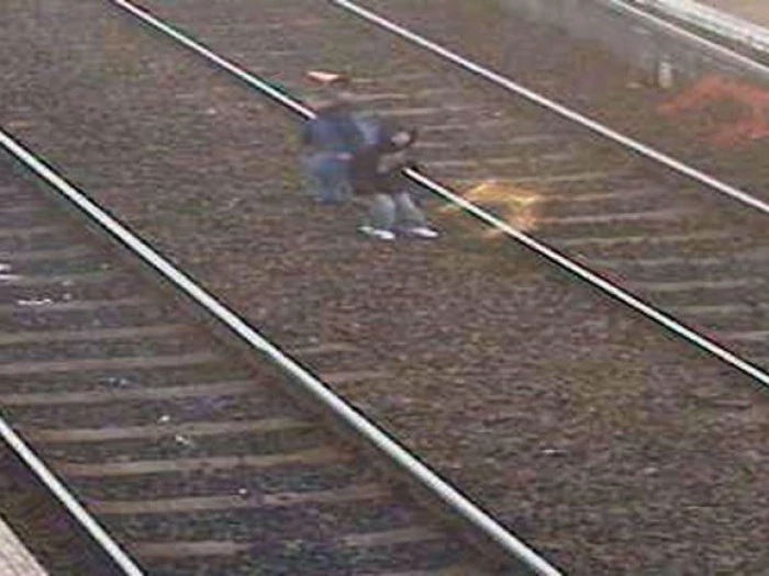 kids on railways tracks 01