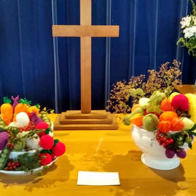 knitted fruit and cross