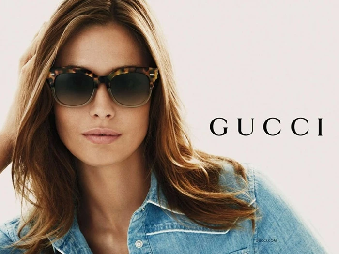 gucci sunglasses with logo on lens