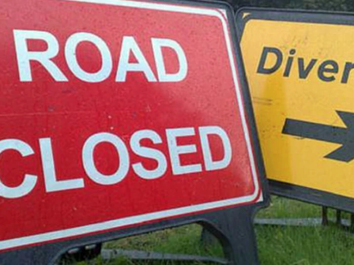 road closed diversion sign