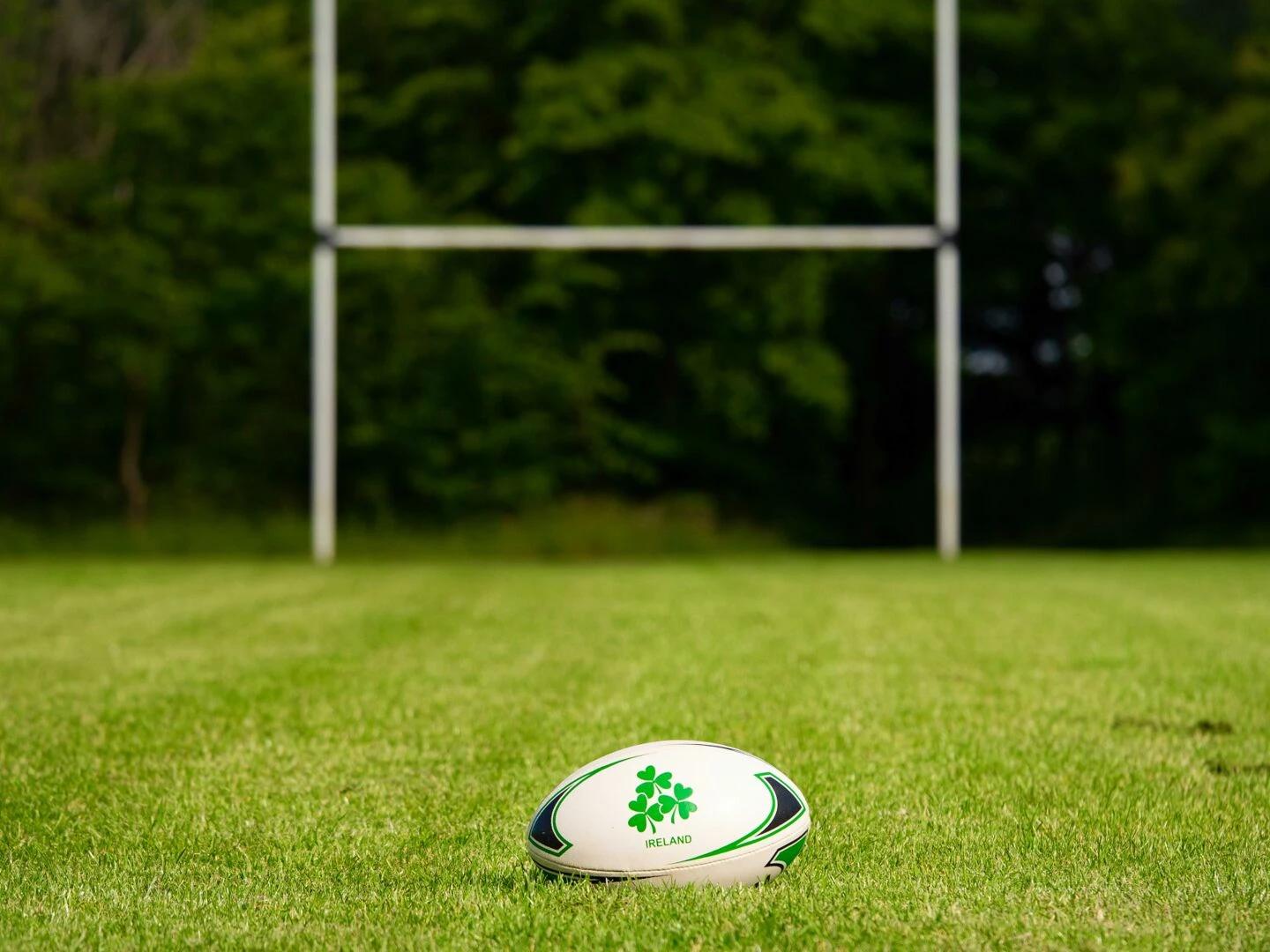 rugby ball on a grassy field with goal posts in the background galway ireland