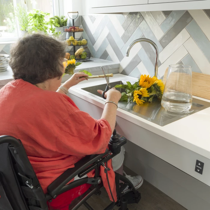 sheila can use the worktop sink with front access