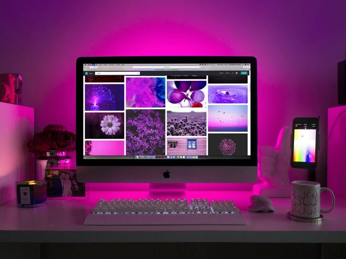 silver imac displaying collage photos