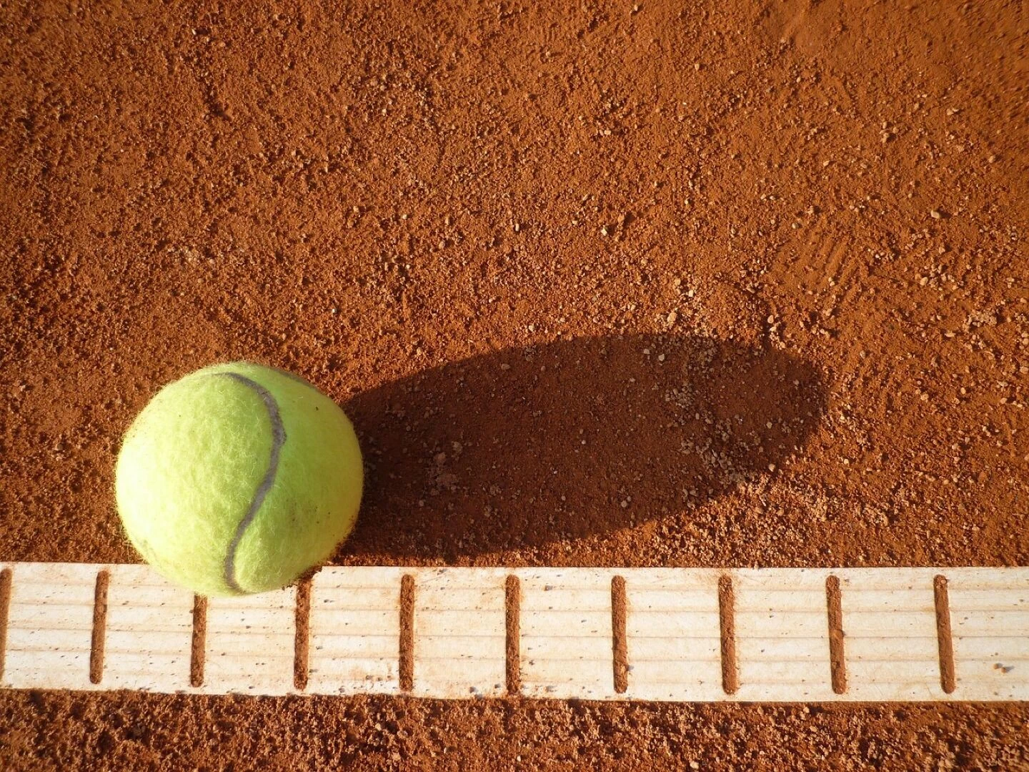 tennis court tennis yellow tennis ball ball sports ball sports line boundary line outside inside in off play tennis tennis court tennis court tennis court tennis tennis tennis tennis tennis tennis ball tennis ball tennis ball boun