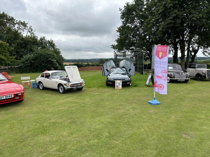 white coupe at fitching show