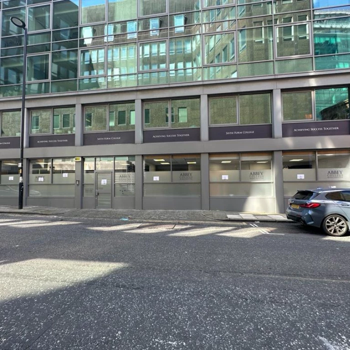 wide view of spray painting and window panels at abbey college manchester